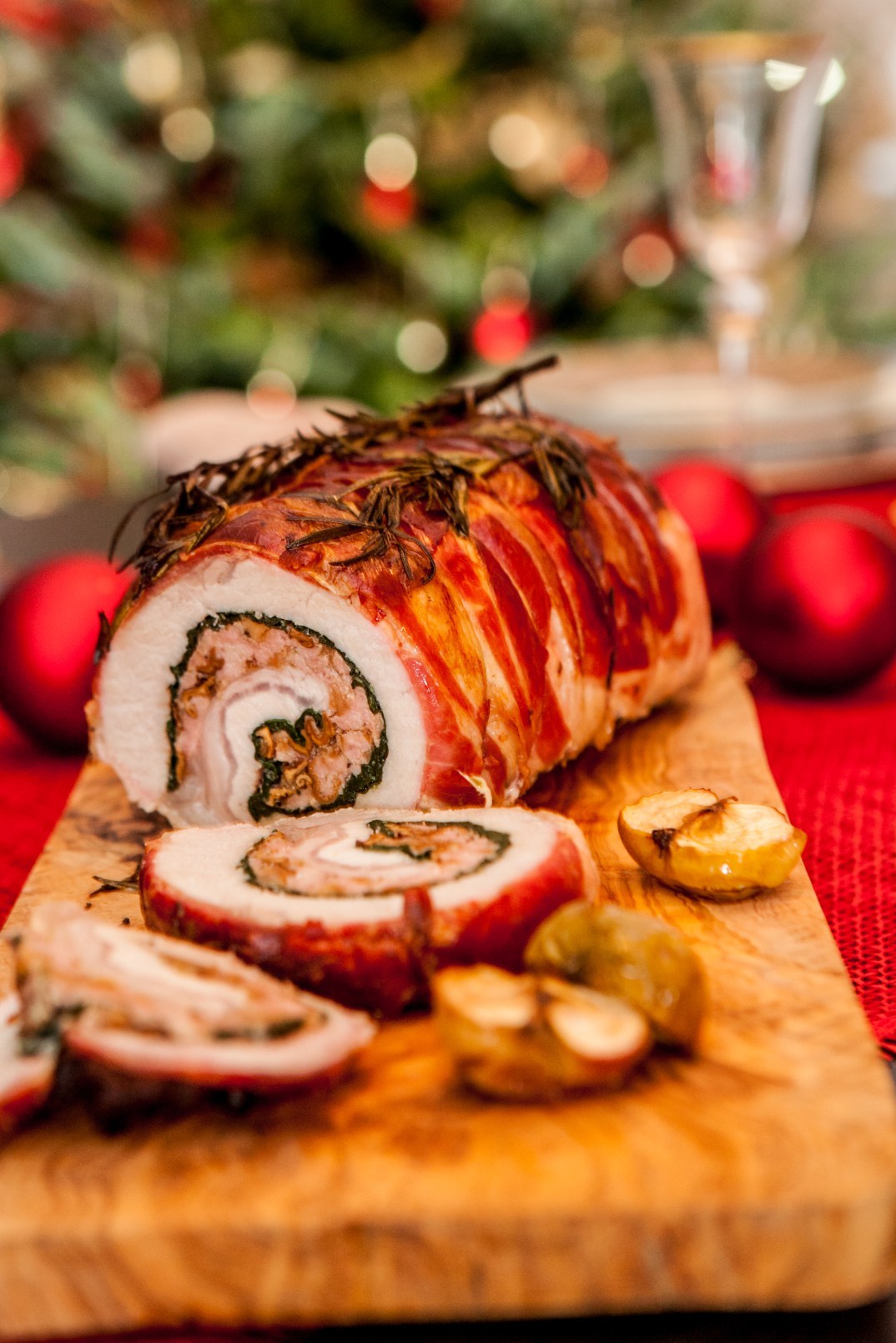Prosciutto wrapped pork loin with roasted apples